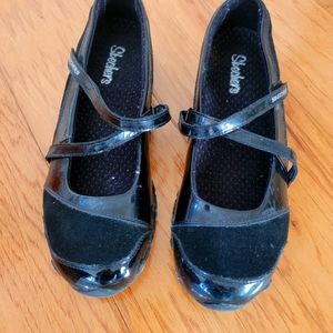 Skechers Woman's black slip on shoes